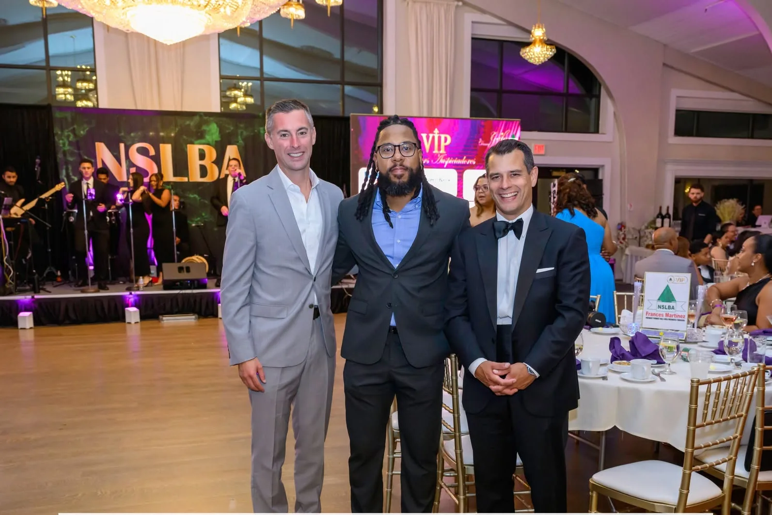 Guests at their table beside the NSLBA stage, 14th Annual Gala